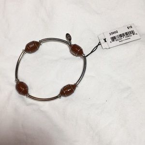 **3 for $20**. Cookie Lee NWT Football Bracelet.